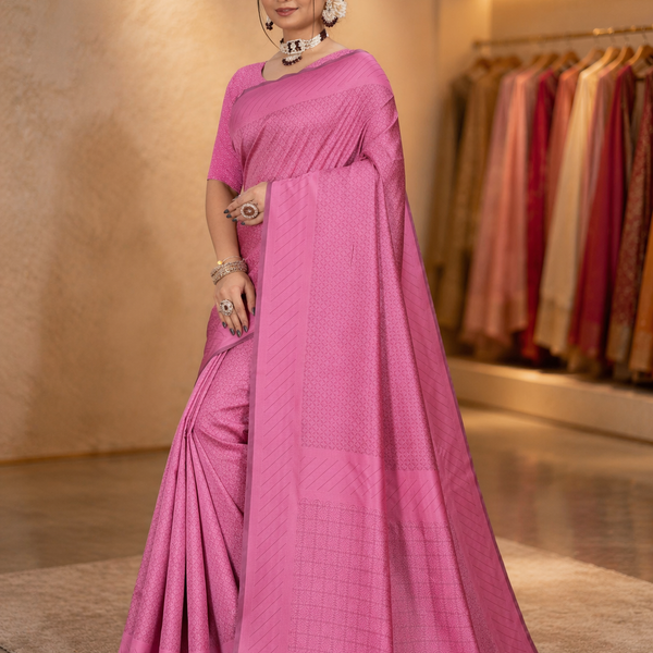Beautiful side profile showing the graceful pleats of the gulabi pink solid silk saree
