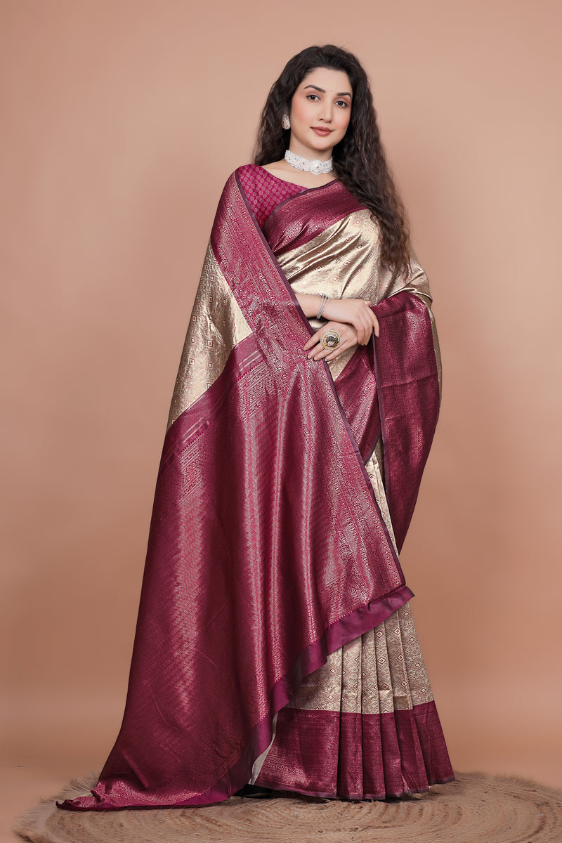 Close up of the heavy zari woven cherry pallu on a traditional silk saree
