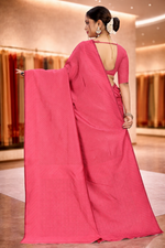 Back view of a model elegantly draped in a gaajri pink solid art silk saree
